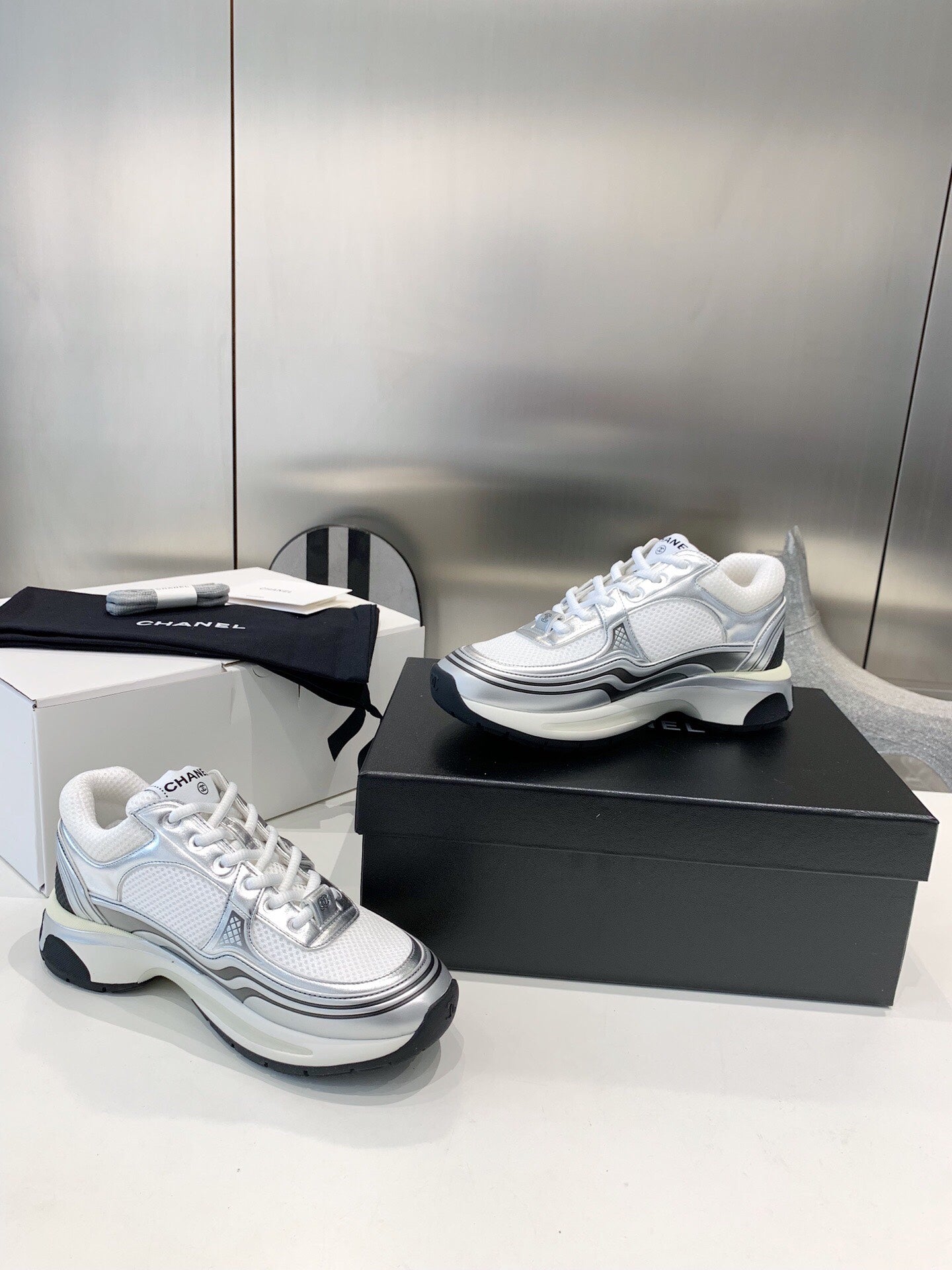 C Silver Explosion Sneakers